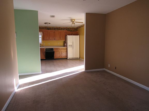 LIVING ROOM LOOKING INTO KIT