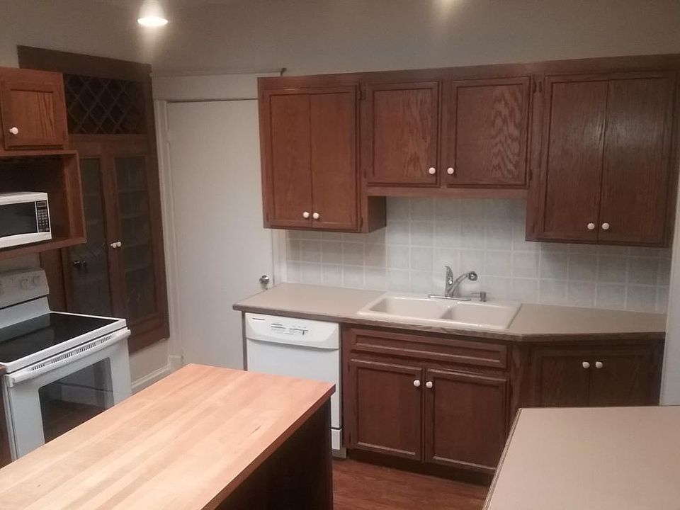 Kitchen, butcher block, 11'x13'2". Hardwood floor, wine rack. Plenty of counter space and cupboards. Skylight.