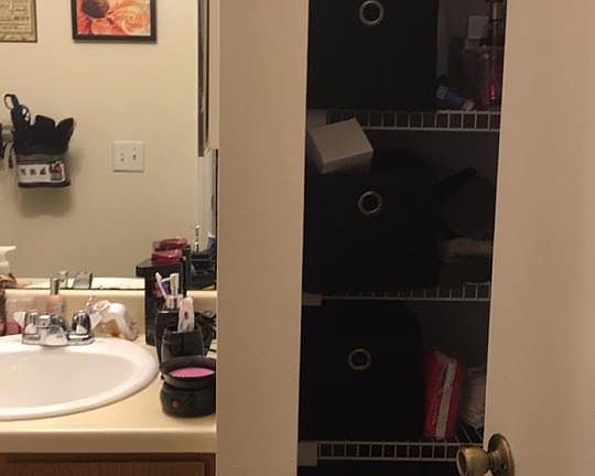 storage closet in bathroom