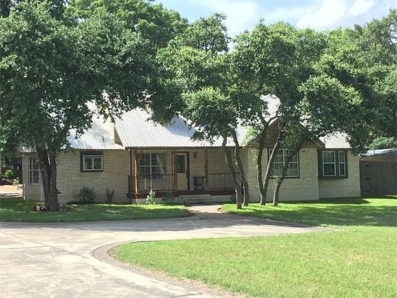 Texas Limestone Rock and a Covered Front Porch, Welcomes you!