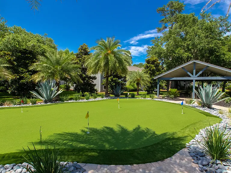 Calling all golf enthusiasts! Perfect your putt while enjoying the lush surroundings in our community before heading out to the courses at Hilton Head Island.