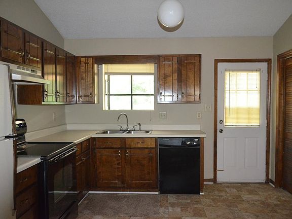 Kitchen with dishwasher, shows greenhouse window