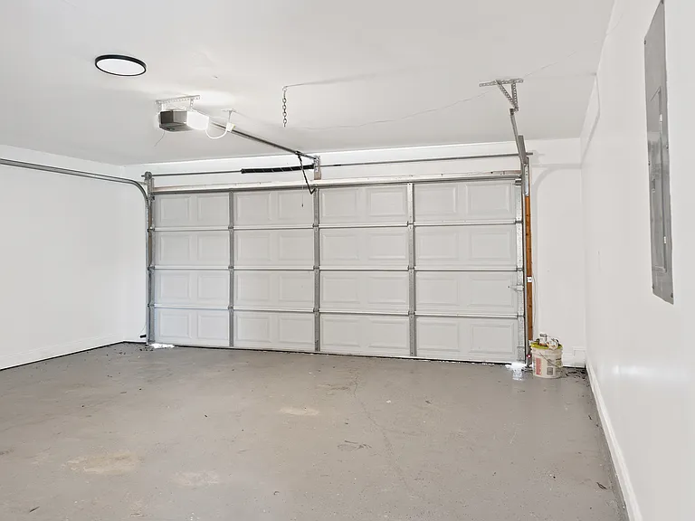 Roomy 2-car garage with automatic opener.