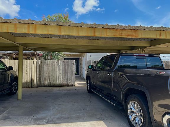 2 parking spaces backing up to back door