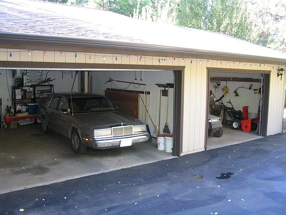 3 car attached garage with additional parking