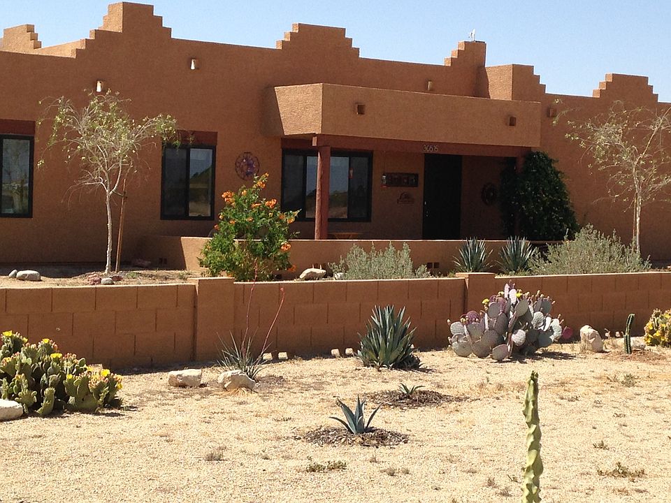 walls and desert landscaping