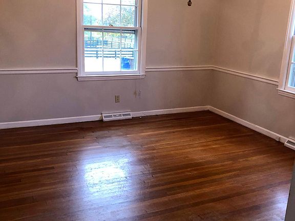Dining room (entry from Kitchen butler door). Window view of horse paddocks
