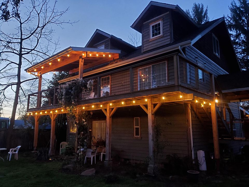 Entry door is on the upper back deck.