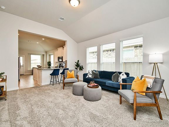 Spend time with family in the living room outfitted for your comfort.