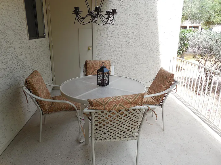 Covered/fenced patio shaded from Summer Sun
