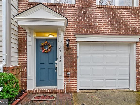 Front entry with portico! Upgraded garage door!