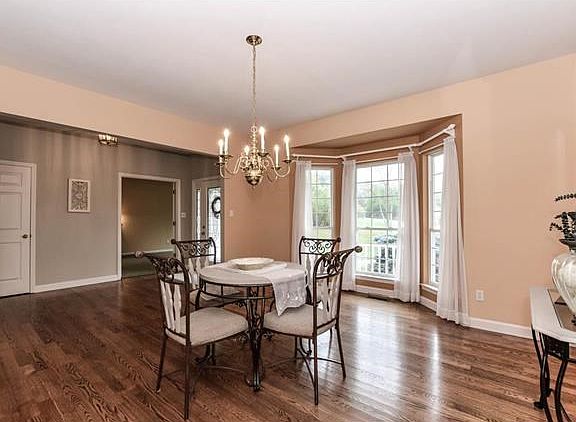 The wood floors in this ranch style home flow through out the open floor plan