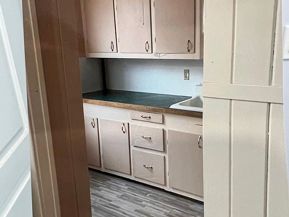 Further cabinet and counter space to the right