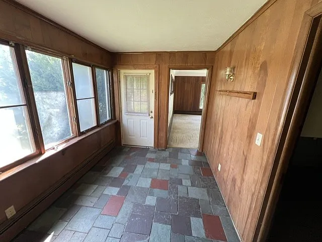 Dining room view to back door entrance.