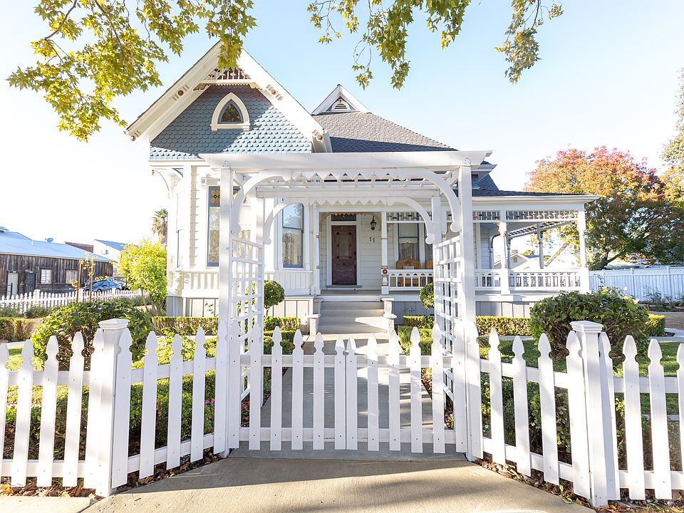 1895 Queen Anne Victorian Charm with wrap around porch!