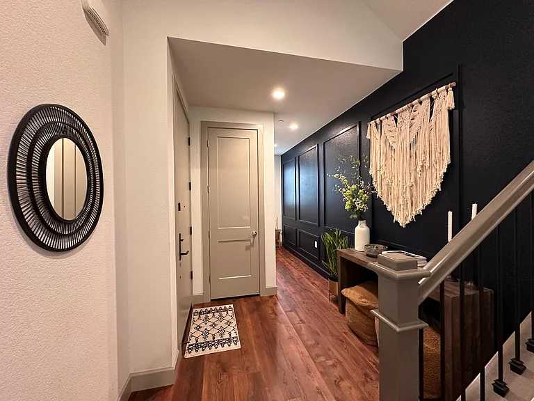 Entrance (1st floor). 
Front door faces East when looking outside