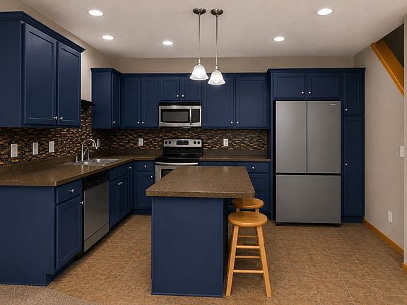 5th image of 2437 121st Cir NE Unit K