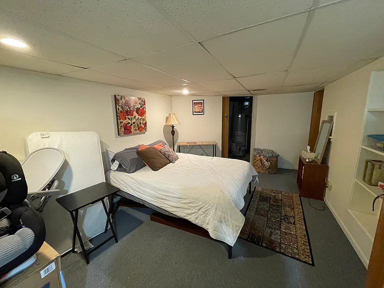 Basement living space, facing southwest.