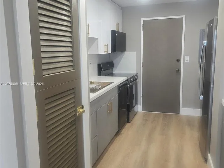9800 W Bay Harbor Dr #305 — Photo 5