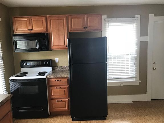 Nice appliances in kitchen. Lots of light! Cork flooring.