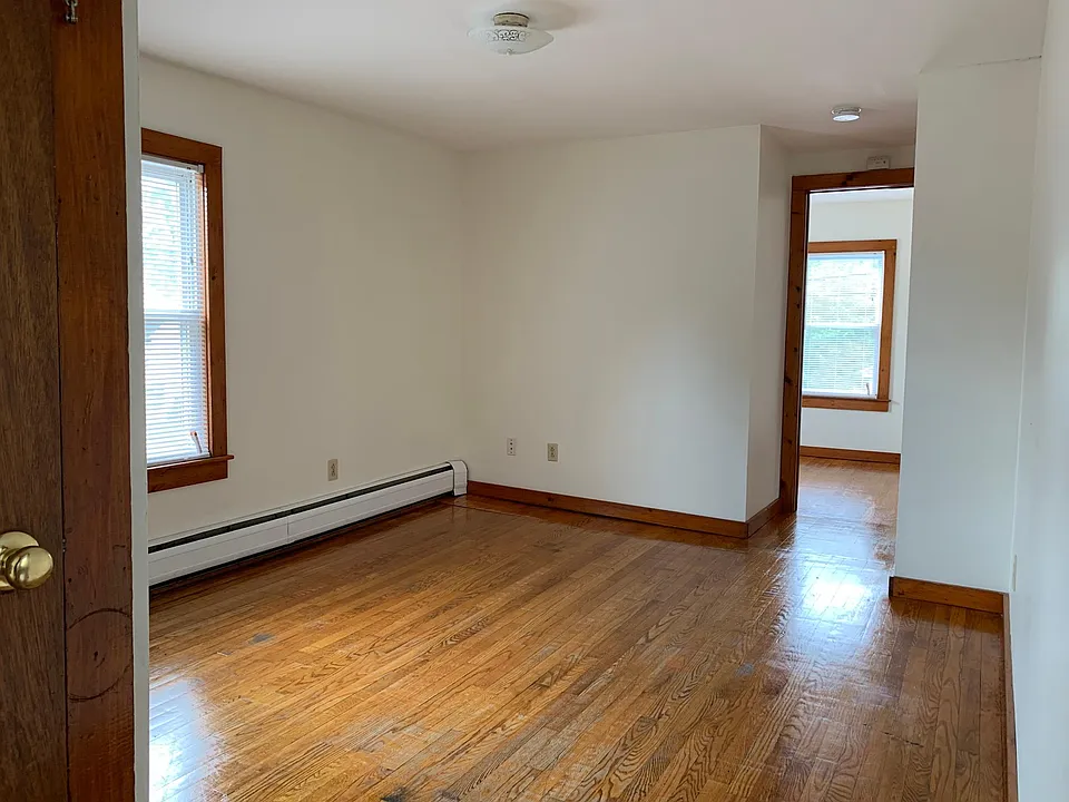 Living room to front bedroom