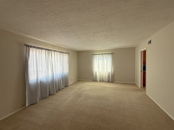 Living Room. Pocket door on right to Kitchen