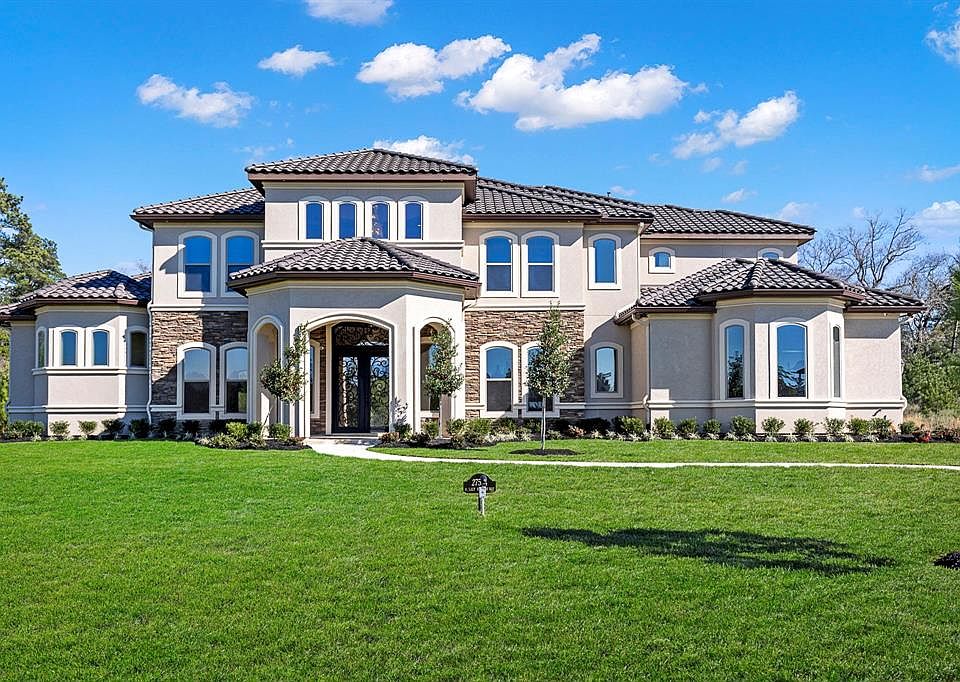 Stunning Modern Mediterranean. Attention to every detail in this beautiful Benders Landing Estates Home.