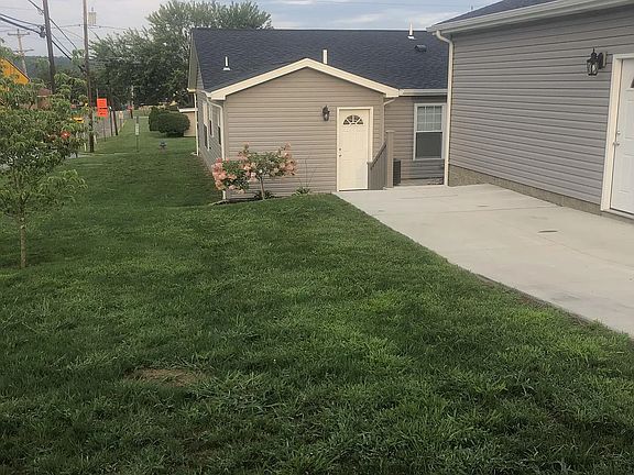 View of side yard and rear of property