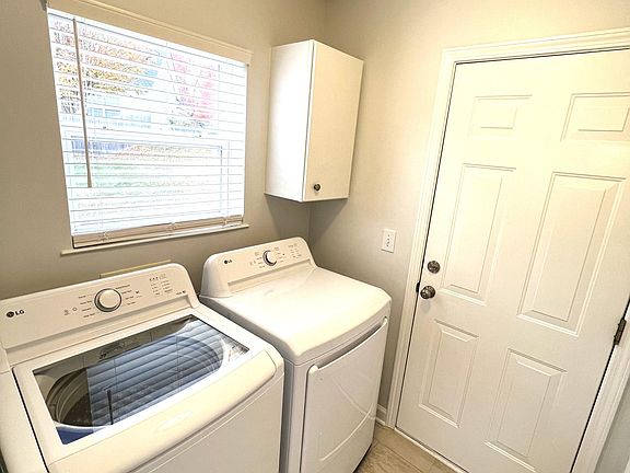 Laundry with New Washer & Dryer