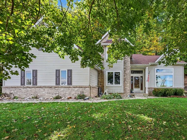 8824 Grand River Dr SE, Ada, MI 49301