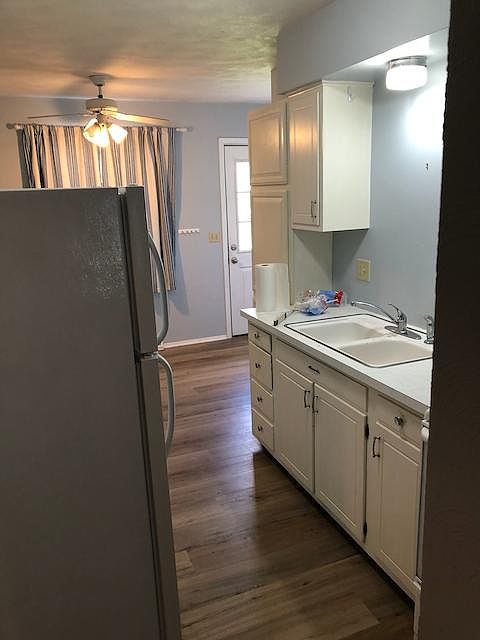 Kitchen with new LVP flooring.