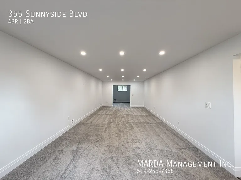 355 Sunnyside Blvd — Photo 43