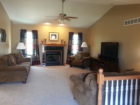 Inviting living room w/FP.