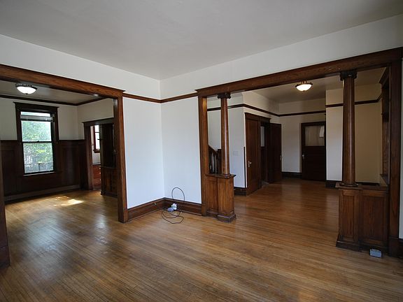 Living room looking into the foyer and dining room.