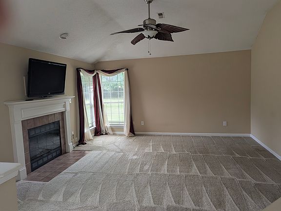 Living room plus fireplace. TV included on swivle mount.