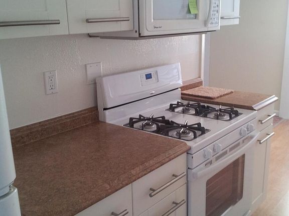 Kitchen gas range and microwave