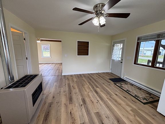 front door from inside kitchen/dining area, looking into living room