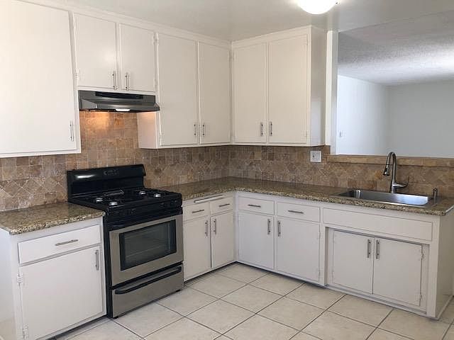 New paint, cabinet hardware and sink!