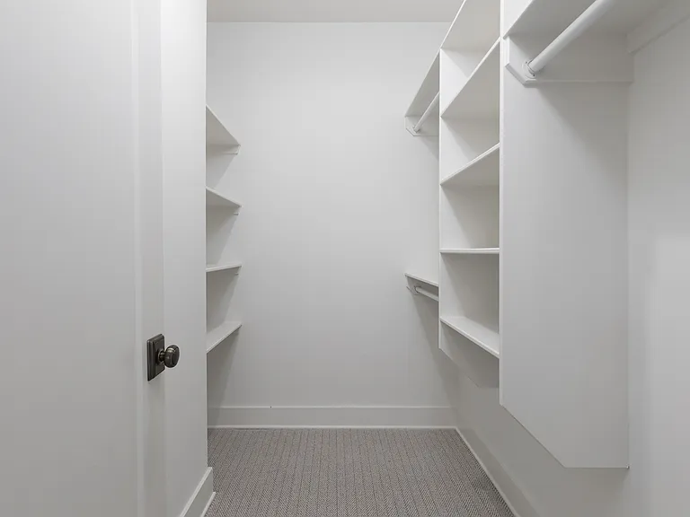 Bedroom 3 with a bunk bed, ensuite bathroom, Smart TV and dresser for your belongings. Also includes a walk-in closet. Located on the 2nd floor.