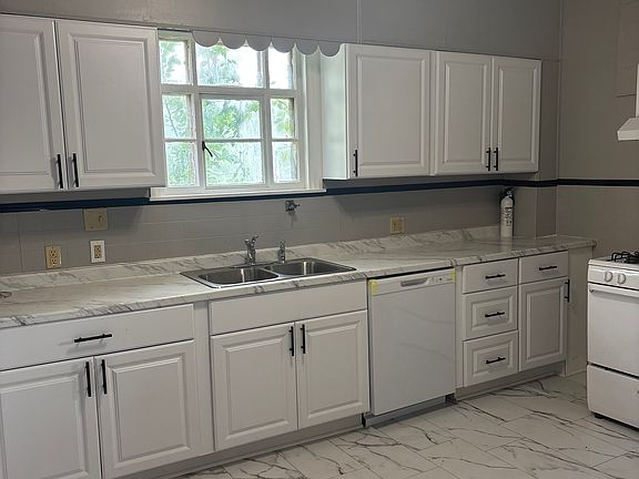 Ceiling fan kitchen with plenty cupboards