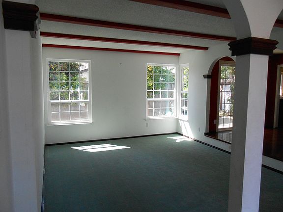Living room (when it was empty; now partially furnished)