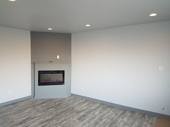 Main living space with new electric fireplace