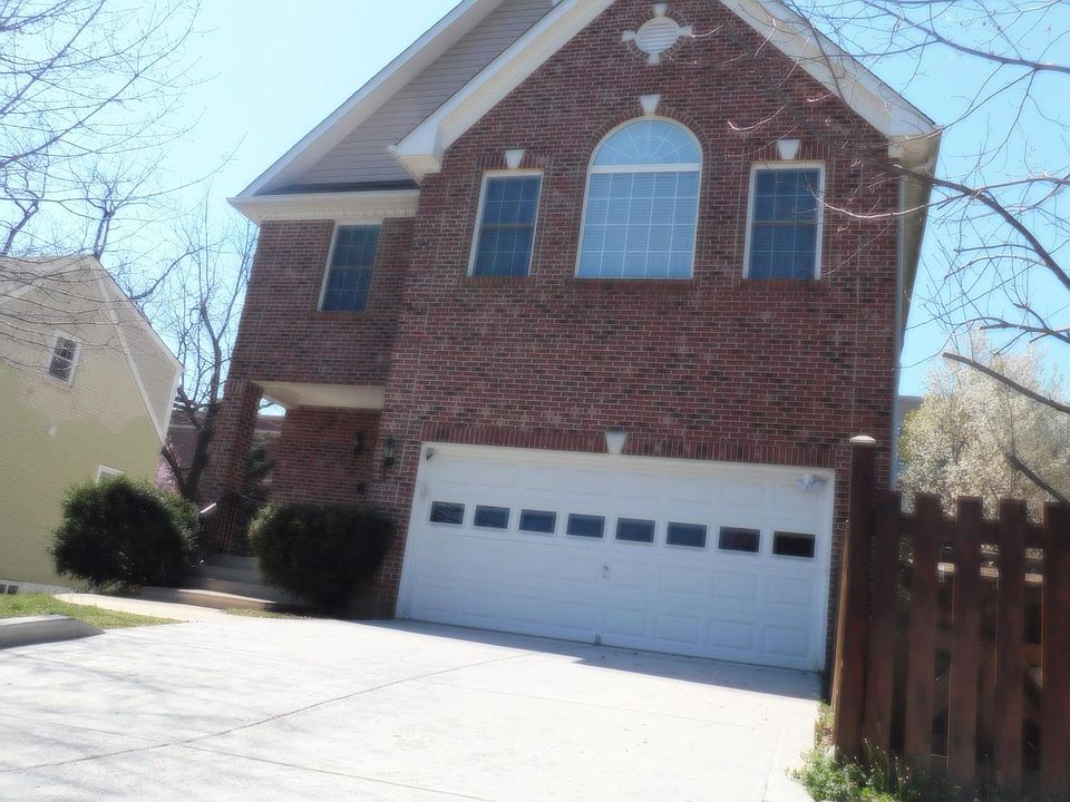 Large two-car driveway and sidewalks