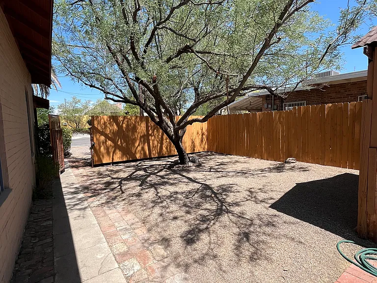 Large fenced side yard.