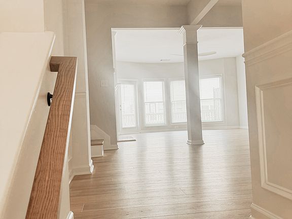 Split level entrance with 17 ft vault ceilings at entrance.