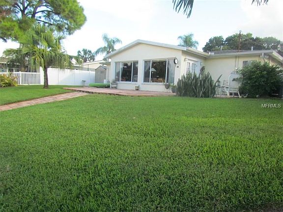 3rd image of 9497 Sun Isle Dr NE