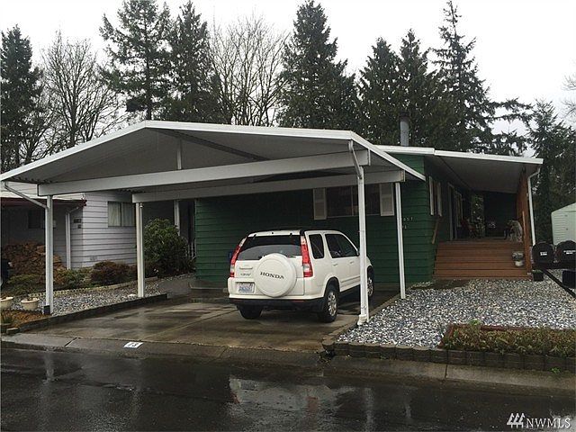 The carport provides covering for 2 of your vehicles.