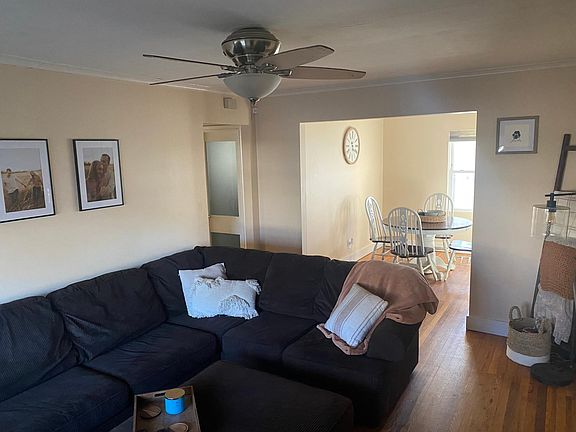 Living area with dining area in background