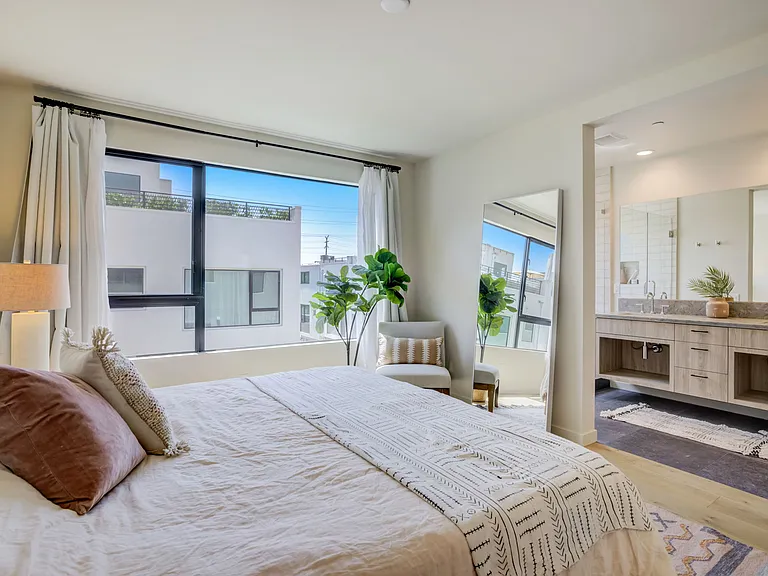 Private primary suite located on the third floor, offering a peaceful retreat from the main living areas.