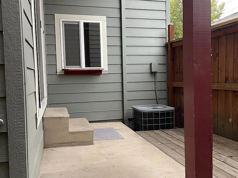 Small back patio suitable for outdoor grilling
